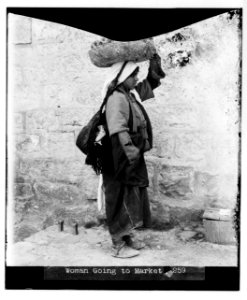 Costumes, characters and ceremonies, etc. Woman going to market LOC matpc.07560