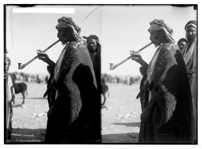 Costumes, characters, etc. Bedouin smoking long pipe LOC matpc.05636