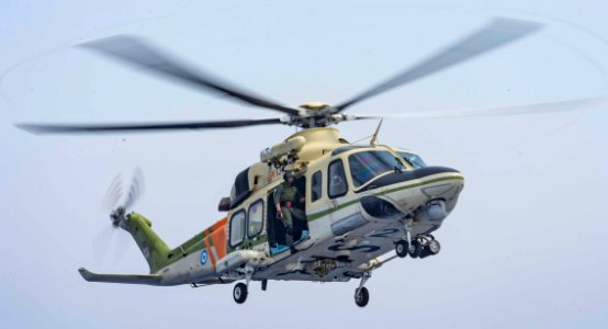 Cyprian AW139 search and rescue helicopter departs the USS Stout (cropped)