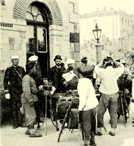 DEMIDOV(1904) p088 OUR BAGGAGE AND PORTERS AT VLADIVOSTOK (14802326493)