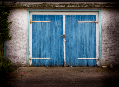 Wooden gate wrought iron goal photo