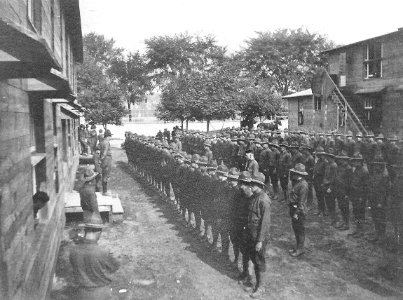 1918 - Camp Crane - Trainees Stand in Formation by Barracks