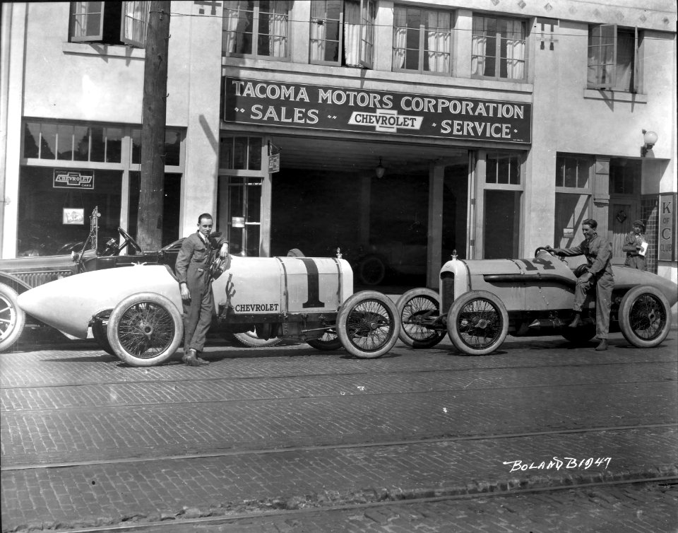 1919 Fred Comer and Harry Hartz in front of the Tacoma Motor Car Company Marvin D Boland Collection BOLANDB1947