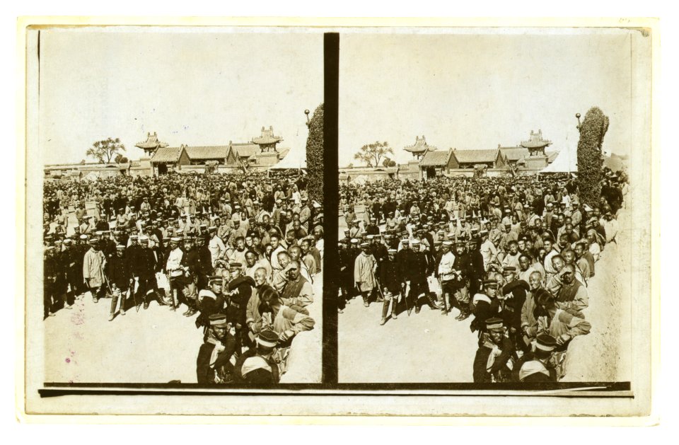 A crowd of Japanese soldiers; Chinese coolies in right foreground, Manchuria LCCN2005678636