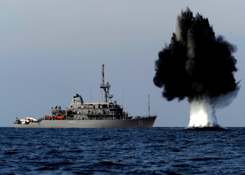 A demolition charge detonates 1,500 meters from Avenger-class mine countermeasures ship USS Scout (MCM 8). The charge was built and detonated by Sailors assigned to Explosive Ordnance Disposal Mobile Unit