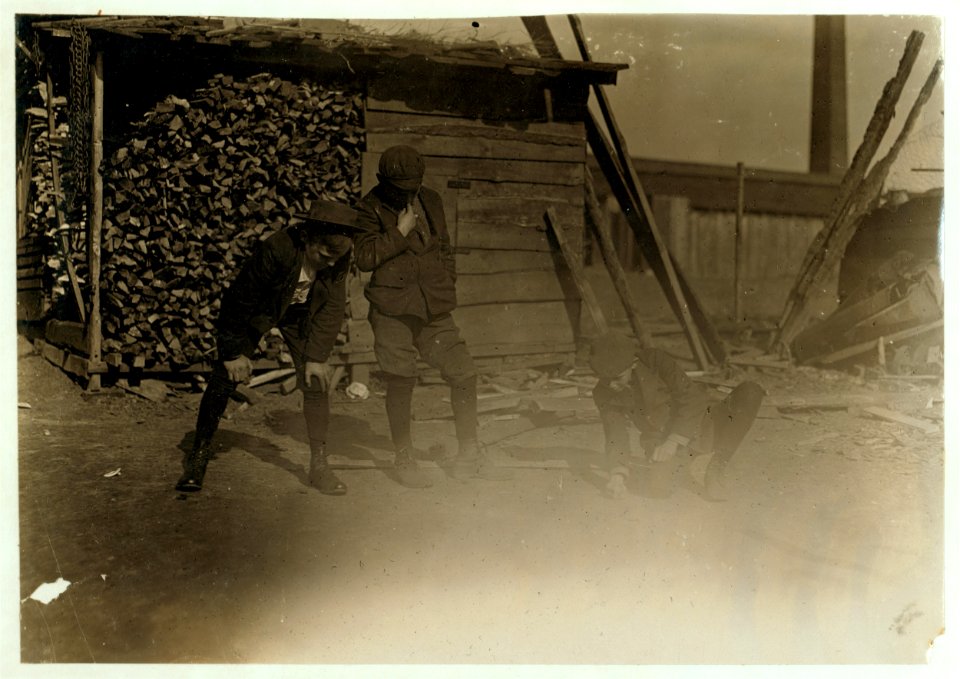 A game of marbles. Smallest boy is Uzzria Dedman, 50 Hill St., Salisbury, N.C. Been in mill 2 years. Other 2 been in 1 year. LOC nclc.01513