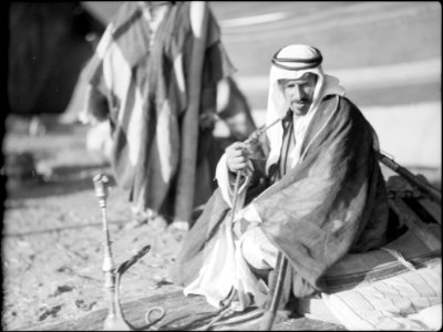 Bedouin life in Trans-Jordan. Sheik Muthgal Pasha. Seated in his tent while camping near Madaba LOC matpc.15660
