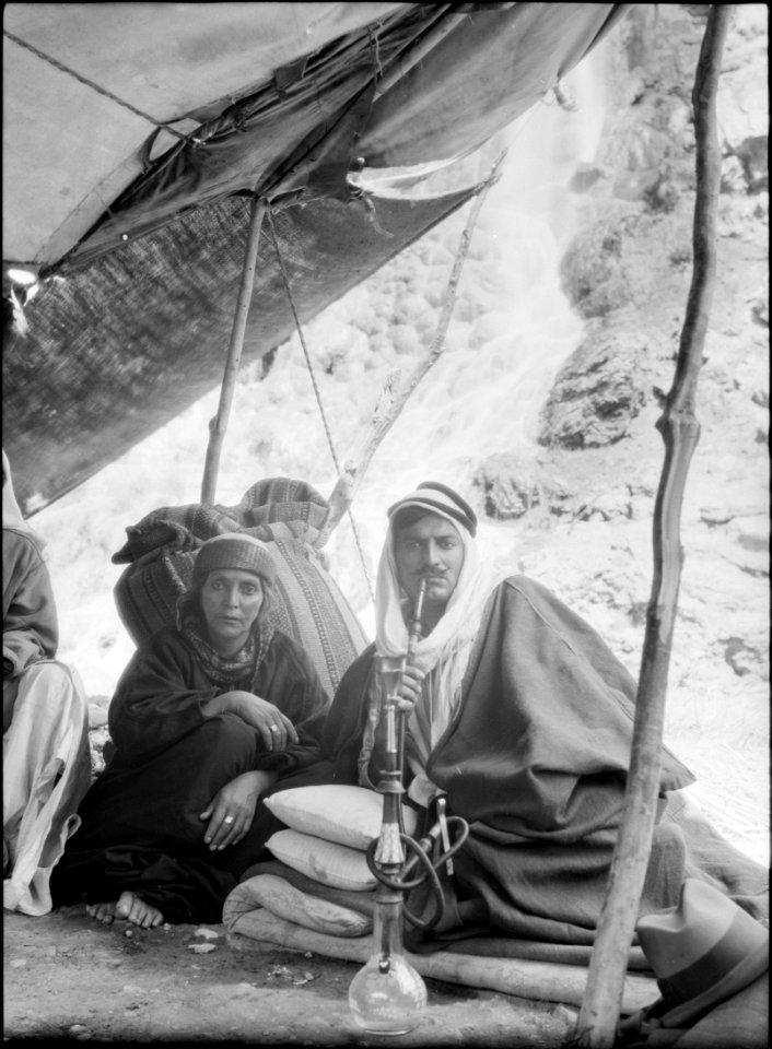 Bedouin life in Trans-Jordan. Semi Bedouin types of Es Salt. Young man and mother at hot springs of Zerka Ma'in LOC matpc.15669