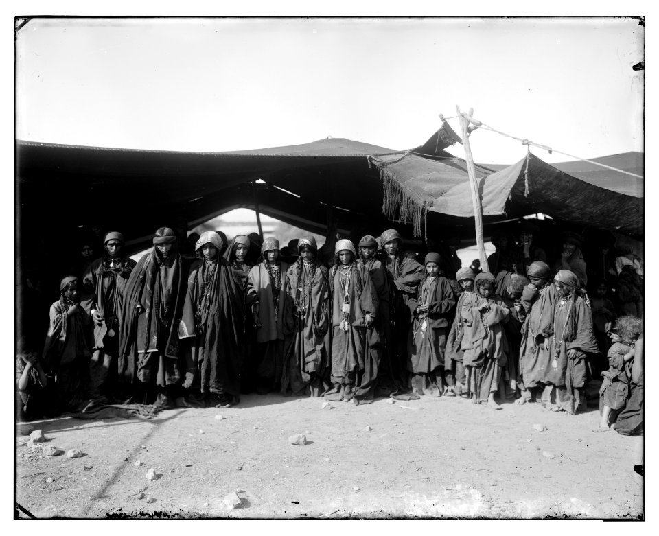 Bedouin women in front of ten(t) in Moab-Adwan tribe LOC matpc.06840