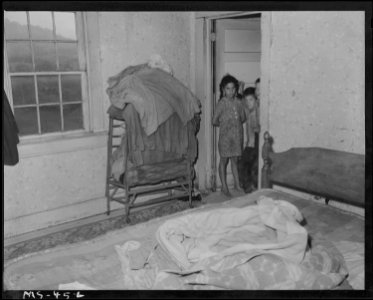 Bedroom and children of Ray Ruiexline, miner. They occupy 4 room house in company housing project. One room is... - NARA - 540240