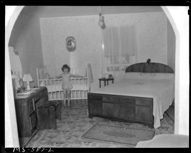 Bedroom in home of miner living in company housing project. Columbia Steel Company, Columbia Mine, Columbia, Carbon... - NARA - 540507 photo