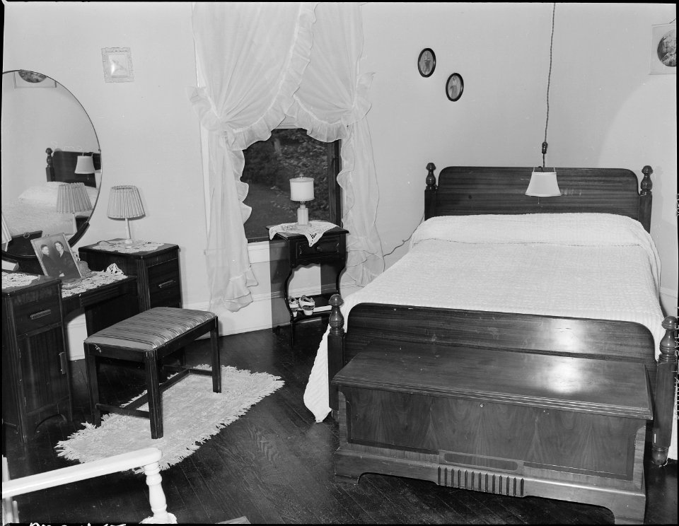 Bedroom in home of Robert Roop, miner, who lives in company housing project. The Pocahontas Corporation, 33-34 Mine... - NARA - 540697