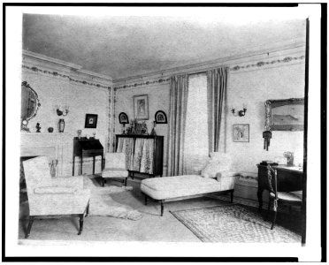 Bedroom with fireplace, padded chaise longue, window, and polar bear rug, in home of Edmund Cogswell Converse, Greenwich, Connecticut LCCN94502517 photo
