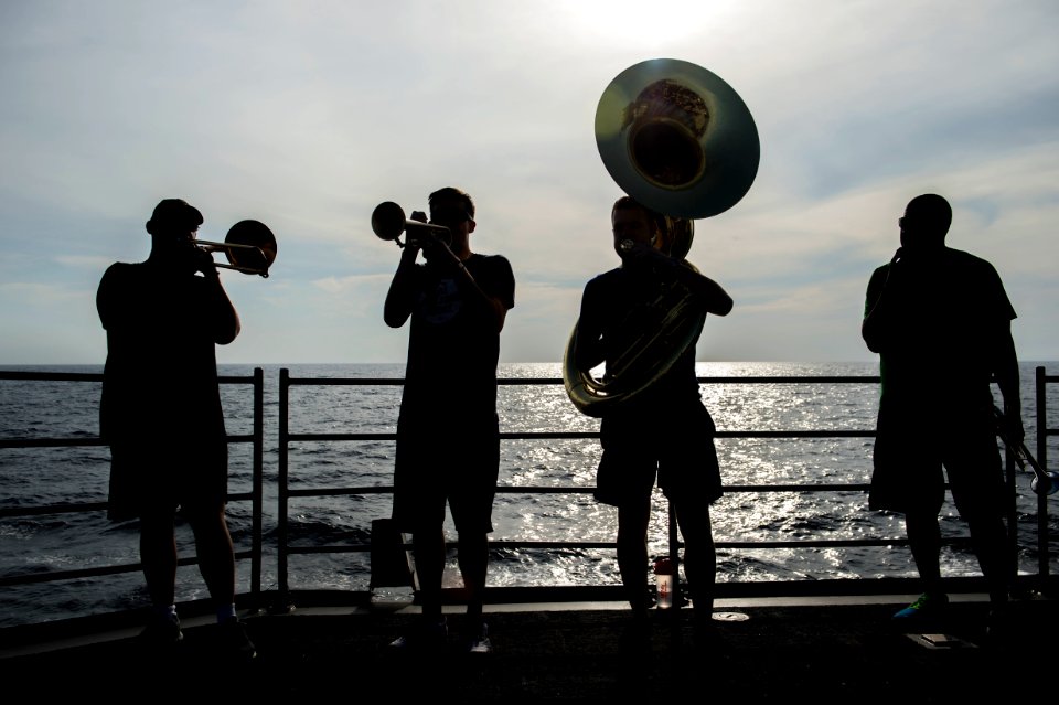 C7F Band puts on a show aboard USS Antietam enroute to the International Fleet Review 160131-N-ZZ786-210