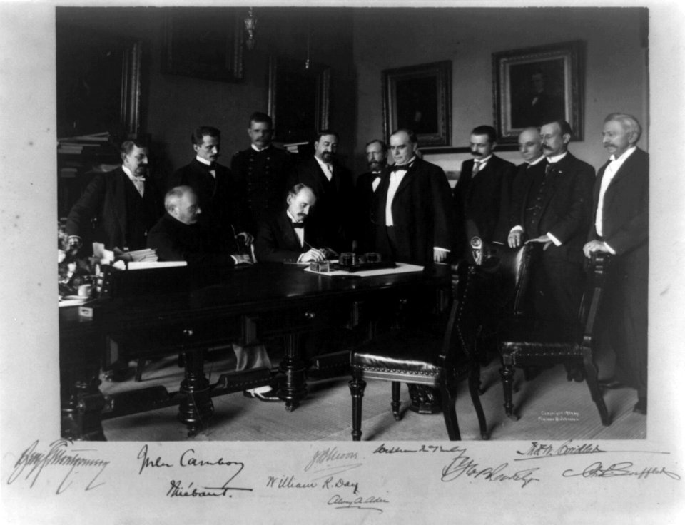 Cabinet Room, White House, Aug. 12, 1898. Secy. of State William R. Day signing LCCN2002717862
