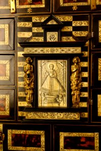 Cabinet with image of the Nino del Remedio, view 2, Castile, 1650-1700 AD, ebonised wood, shell, bone, bronze - Museo Nacional de Artes Decorativas - Madrid, Spain - DSC07973 photo