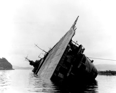 Capsized Japanese aircraft carrier Amagi at the Kure Naval Arsenal, Japan, on 8 October 1945 (NNAM.1996.488.037.007)
