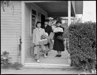Centerville, California. Members of farming families are pictured as they left for Centerville, one . . . - NARA - 537549