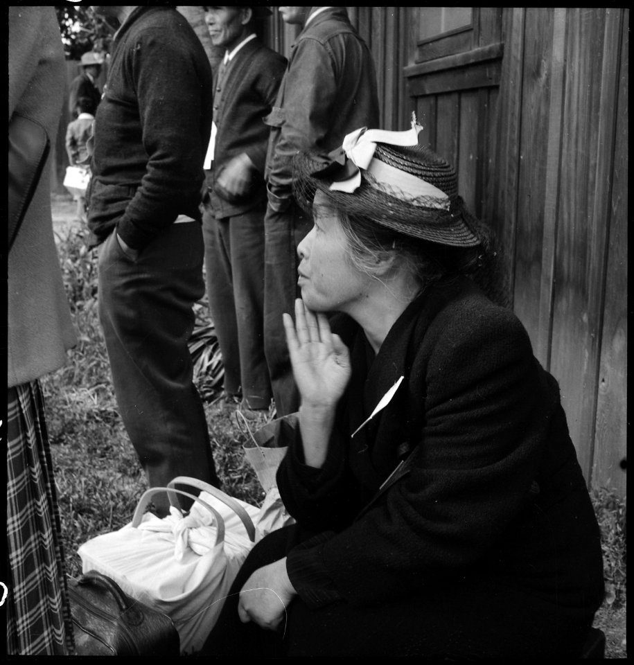 Centerville, California. A farm mother awaits evacuation bus. Evacuees of Japanese ancestry will b . . . - NARA - 537561