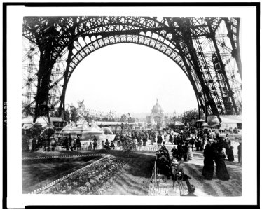 Central Dome seen through the base of the Eiffel Tower, and crowd on the Champ de Mars with the Fountain St. Vidal at left, Paris Exposition, 1889 LCCN92519764