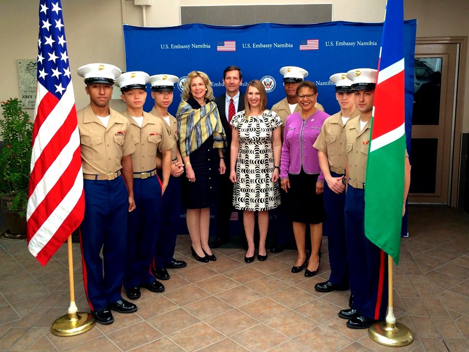 Deputy Secretary Higginbottom, Ambassadors Daughton and Birx, and Representative Bass Pose for a Photo With Marine Guards at Embassy Windhoek