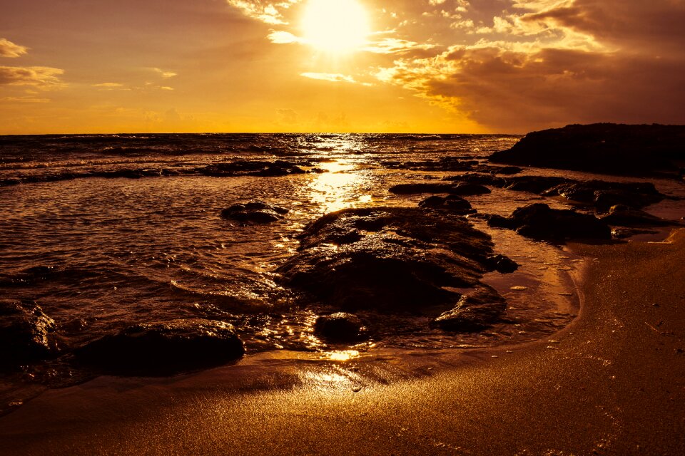 Rock sand sun