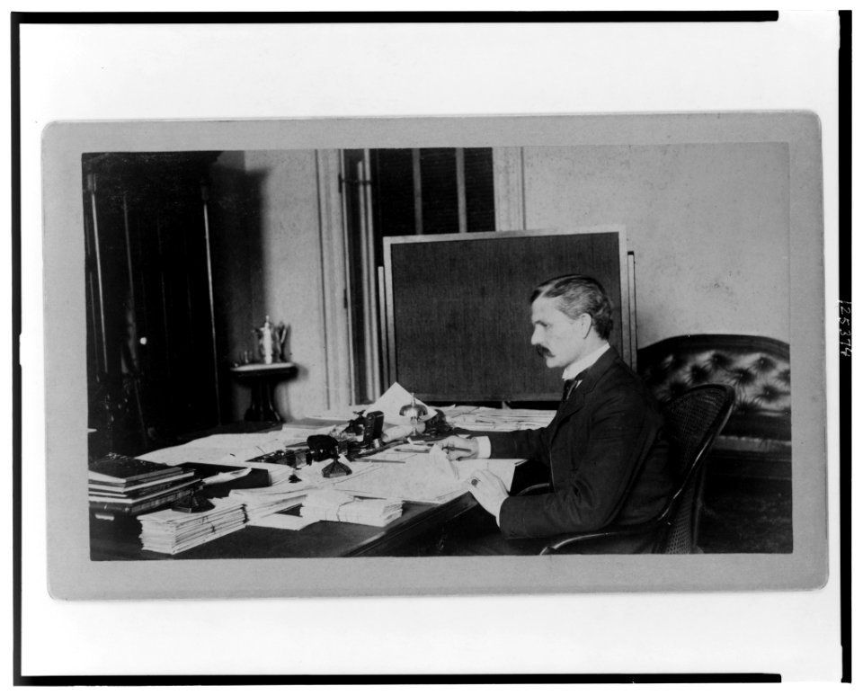 Dr. Miller, Treasury Department employee, half-length portrait, seated at desk, facing left LCCN00649572