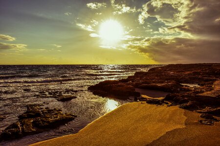 Rock sand sun photo