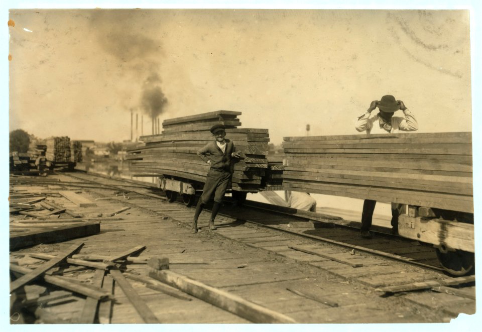 General Utility Boy at Lutcher & Moore Lumber Co. 'I'm fourteen years old; been here one year. Get $1.00 a day.' He runs errands and helps around. I saw him pushing some of these empty cars. LOC nclc.05544