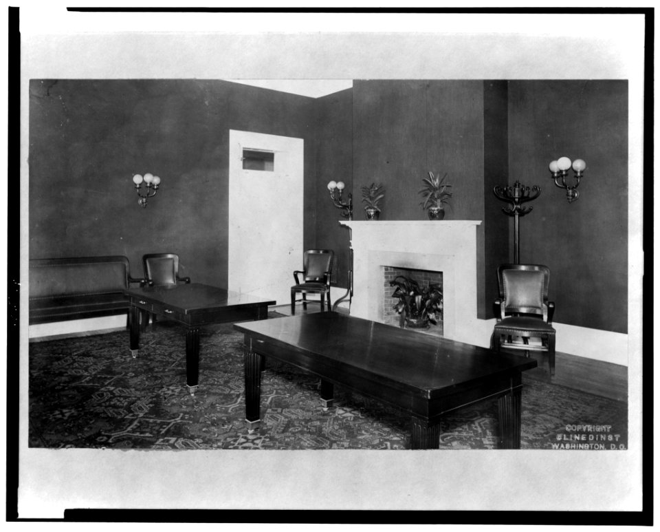General view of room with tables and fireplace in the White House, Washington, D.C. LCCN2002706943