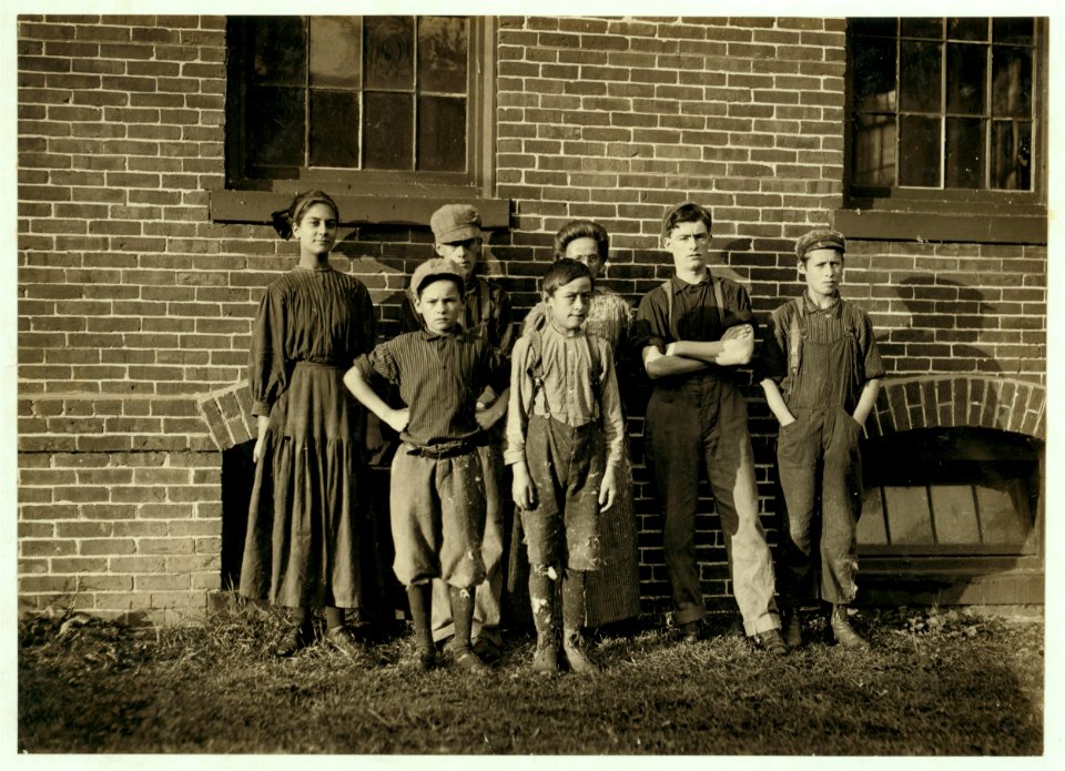 Erenne La Prise, on left, apparently 13 years old, a doffer at Spring Village Mill, said he had been working a year and a half. Als de Gauthier, apparently under 14 (next Erenne) also a LOC nclc.02305