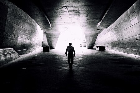 Alone walking tunnel photo