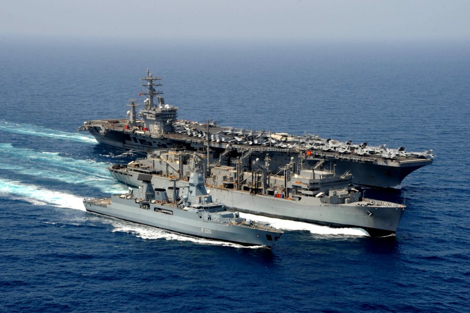 FGS Hamburg steams alongside USNS Bridge as USS Dwight D. Eisenhower approaches. (8592539936)