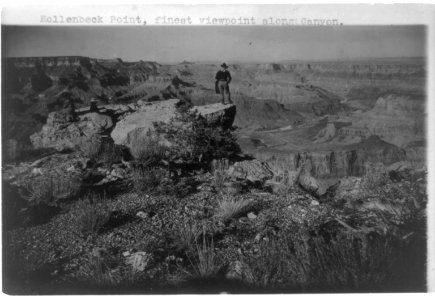 Grand Canyon and vicinity)- Hollenbeck Point, finest view point along canyon (with 3 people on large rock LCCN2002718452