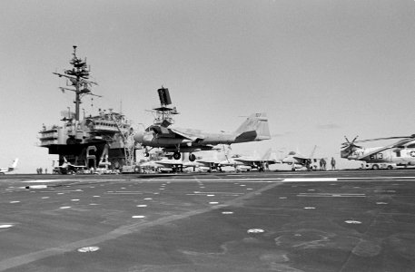 Grumman A-6E Intruder of VA-128 lands aboard USS Constellation (CV-64), in 1987 (6419850)