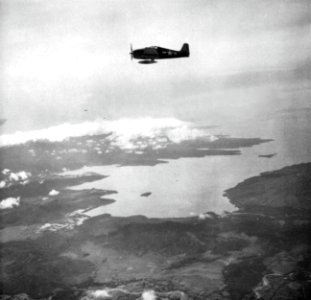 Grumman F6F Hellcats of VF-8 in flight over Luzon, Philippines, in September 1944
