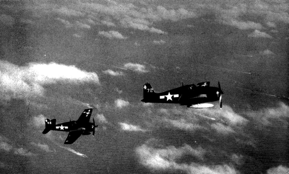Grumman F6F-5 Hellcats of VF-82 in flight over the Pacific Ocean, in 1945