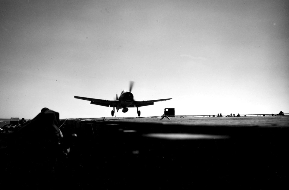 Grumman F6F-3 Hellcat landing aboard USS Cowpens (CVL-25), circa in mid-1943 (80-G-K-1077)