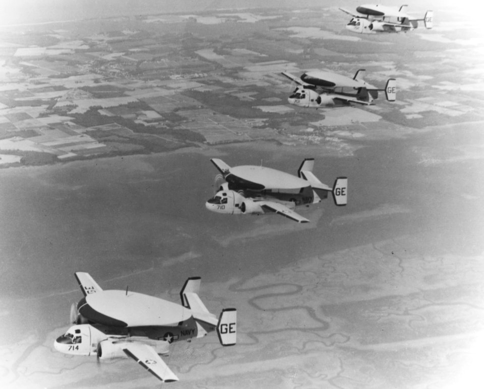 Grumman E-1B Tracers of VAW-12 in flight in the 1960s