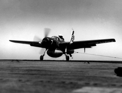 Grumman AF-2W Guardian of VS-37 lands aboard the USS Princeton (CVS-37) in the Pacific Ocean on 4 March 1955 (NNAM.1996.253.6239)