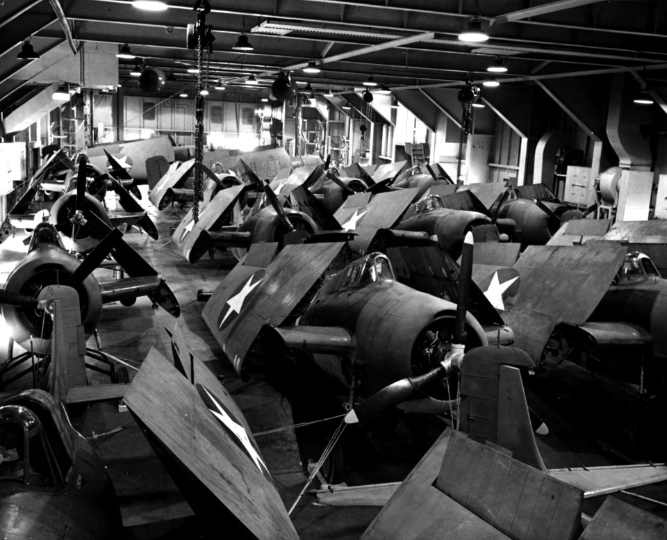Grumman F4F-4 Wildcat on the hanger deck of USS Charger (ACV-30), 2 October 1942 (NH 55072)