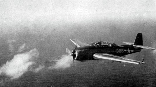 Grumman TBF Avenger of VT-60 in flight over USS Suwannee (CVE-27), circa in 1944