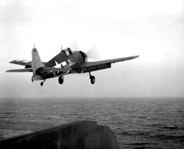 Grumman F6F-3 Hellcat is launched from USS Bataan (CVL-29) on 1 January 1944 (80-G-260767)