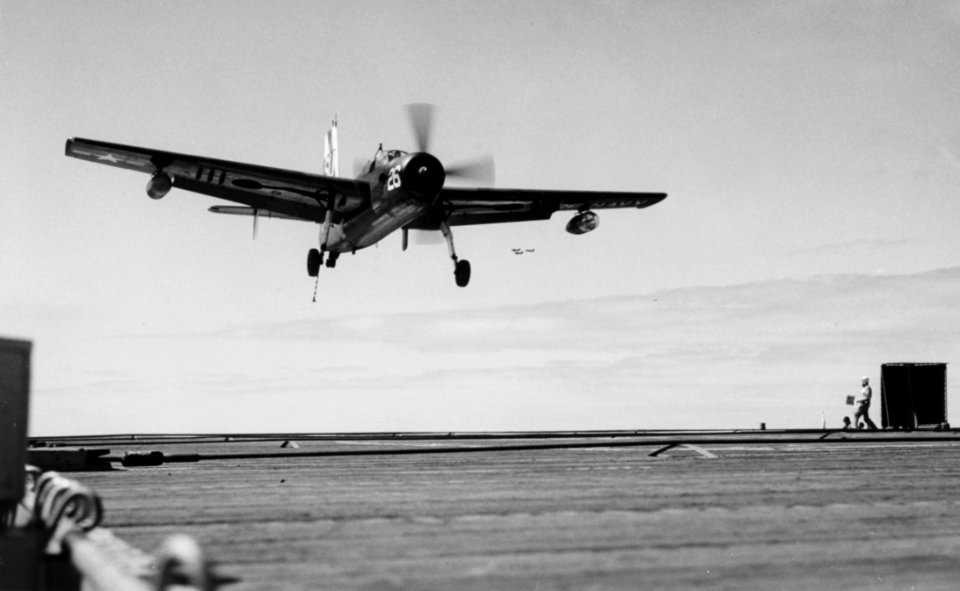 Grumman AF-2S Guardian of VS-37 landing aboard USS Badoeng Strait (CVE-116) on 1 April 1954 (NH 52419)