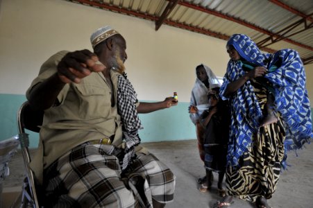 Hanle II Village Chief Ali Gadito Ali Hands Out Albendazole DVIDS160007