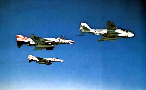 Grumman KA-6D Intruder of VMA(AW)-224 refuels McDonnell F-4B Phantom IIs of VF-111, circa in 1972