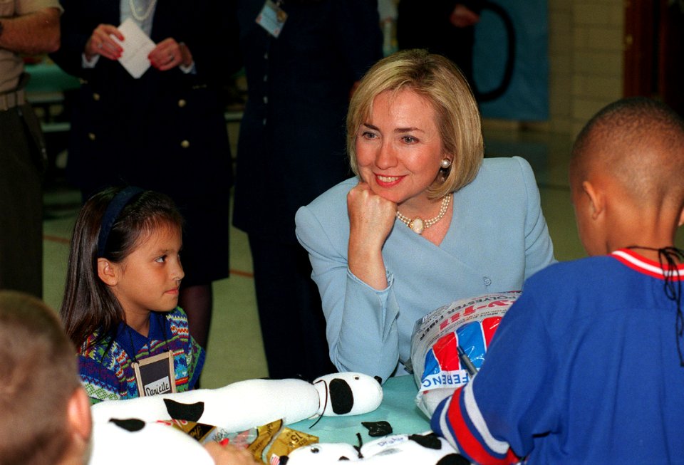 Hillary Rodham Clinton visits with children at the Child Development Center