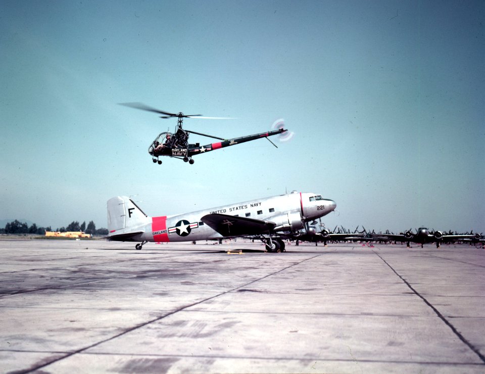 Hiller HTE-2 flies over a Douglas R4D-5 at Naval air Station Oakland, Califronia (USA), on 5 June 1953 (80-G-K-16515)