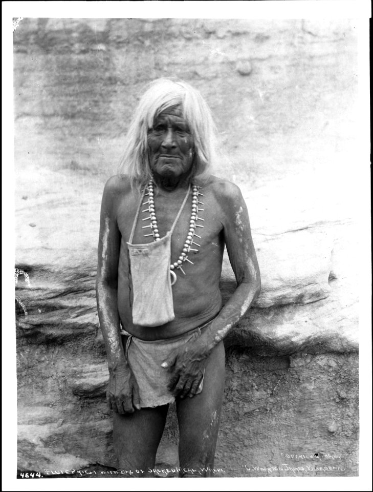 Hopi Priest with bag of sacred meal for the Flute Dance Ceremony at the pueblo of Walpi, Arizona, ca.1898 (CHS-4644)