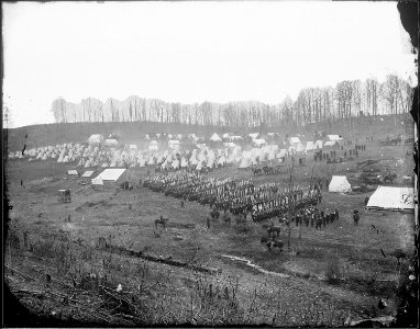 Infantry regiment in camp. (Probably 96th Pennsylvania Infantry at Camp Northumberland near Washington, DC, ca. 1861)... - NARA - 524905